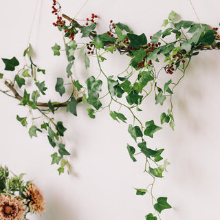 Guirnalda de fulles d'heura de vinya de flors artificials de glicines, flors de roses de seda, vinya de corda de vímet, flor d'arc de casament, decoració del jardí de la llar