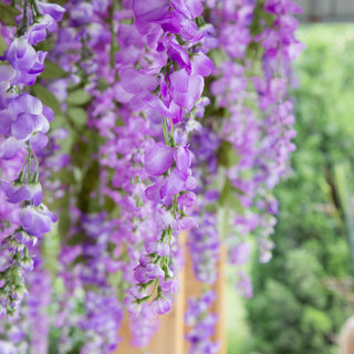 Guirnalda de fulles d'heura de vinya de flors artificials de glicines, flors de roses de seda, vinya de corda de vímet, flor d'arc de casament, decoració del jardí de la llar