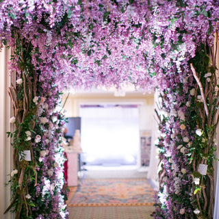 Guirnalda de fulles d'heura de vinya de flors artificials de glicines, flors de roses de seda, vinya de corda de vímet, flor d'arc de casament, decoració del jardí de la llar