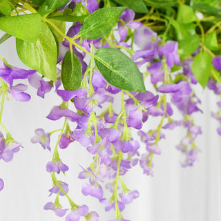 Guirnalda de fulles d'heura de vinya de flors artificials de glicines, flors de roses de seda, vinya de corda de vímet, flor d'arc de casament, decoració del jardí de la llar